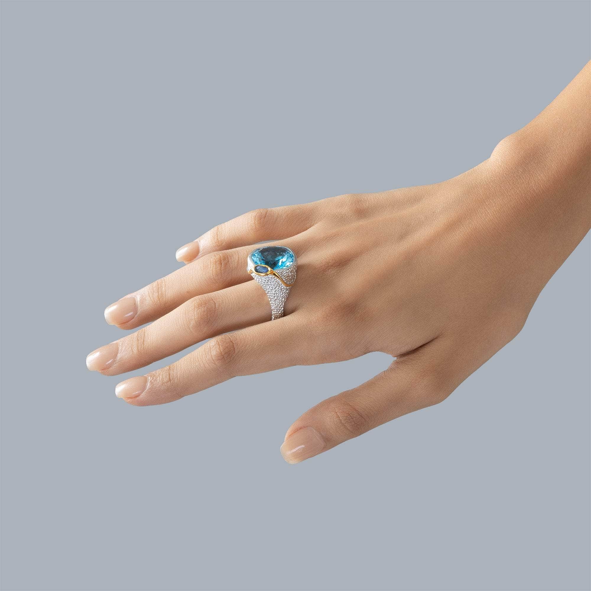 Polaris Blue Topaz and Sapphire Ring