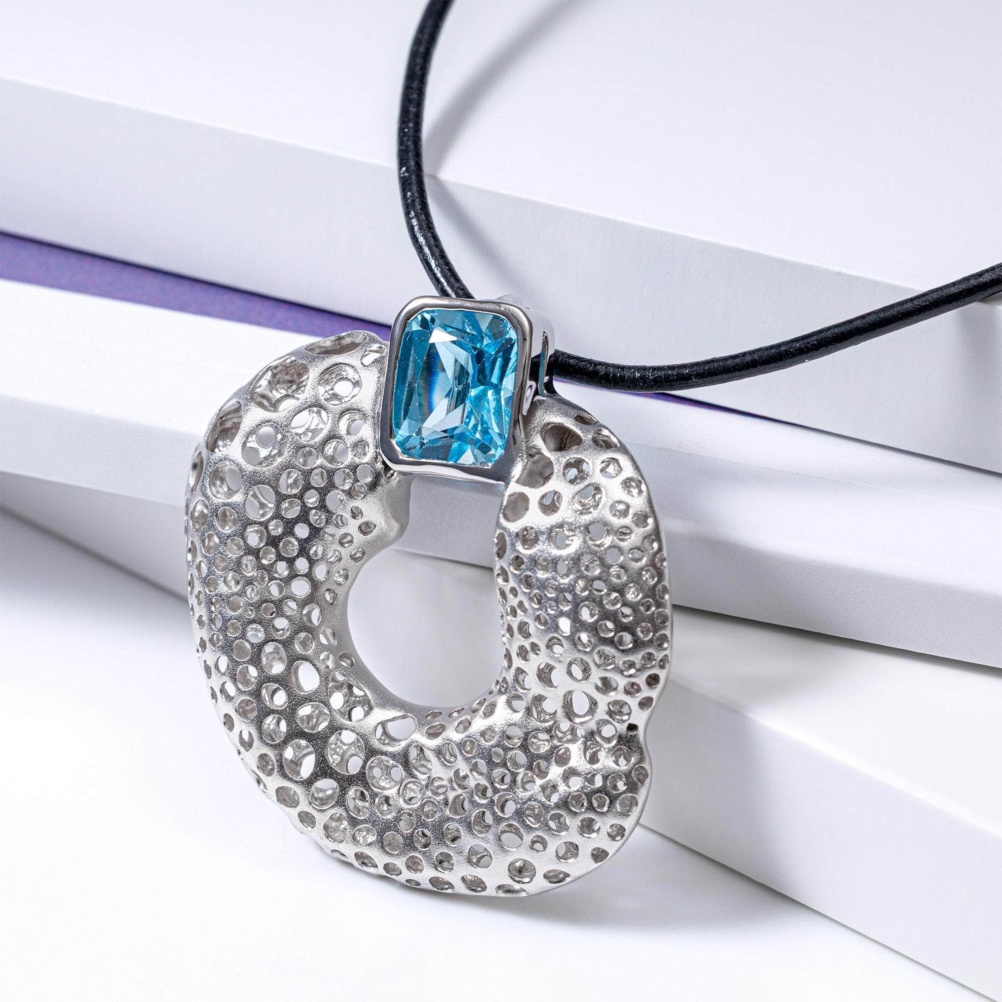 Hebe One of a Kind Pendant in White Rhodium Plated Sterling Silver with Blue Topaz