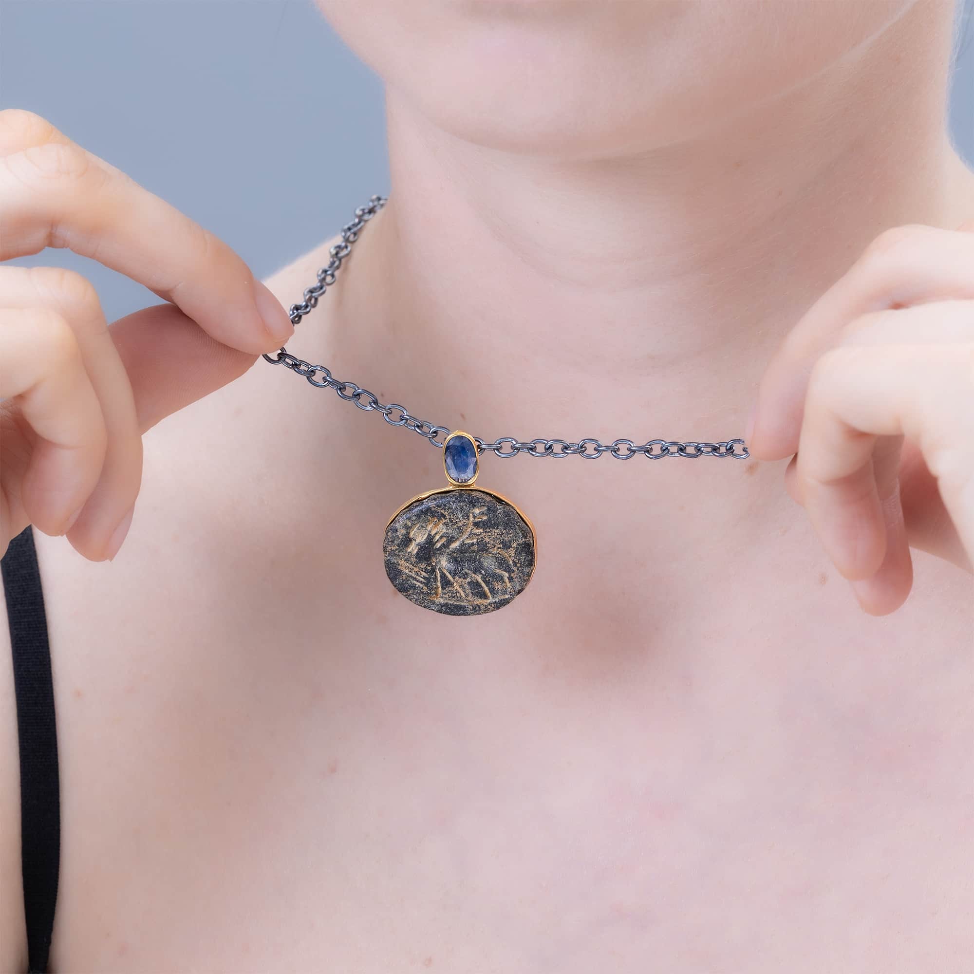 Shedu Silver Necklace with Ancient Near Eastern Steatite Winged Figure Amulet and Natural Sapphire