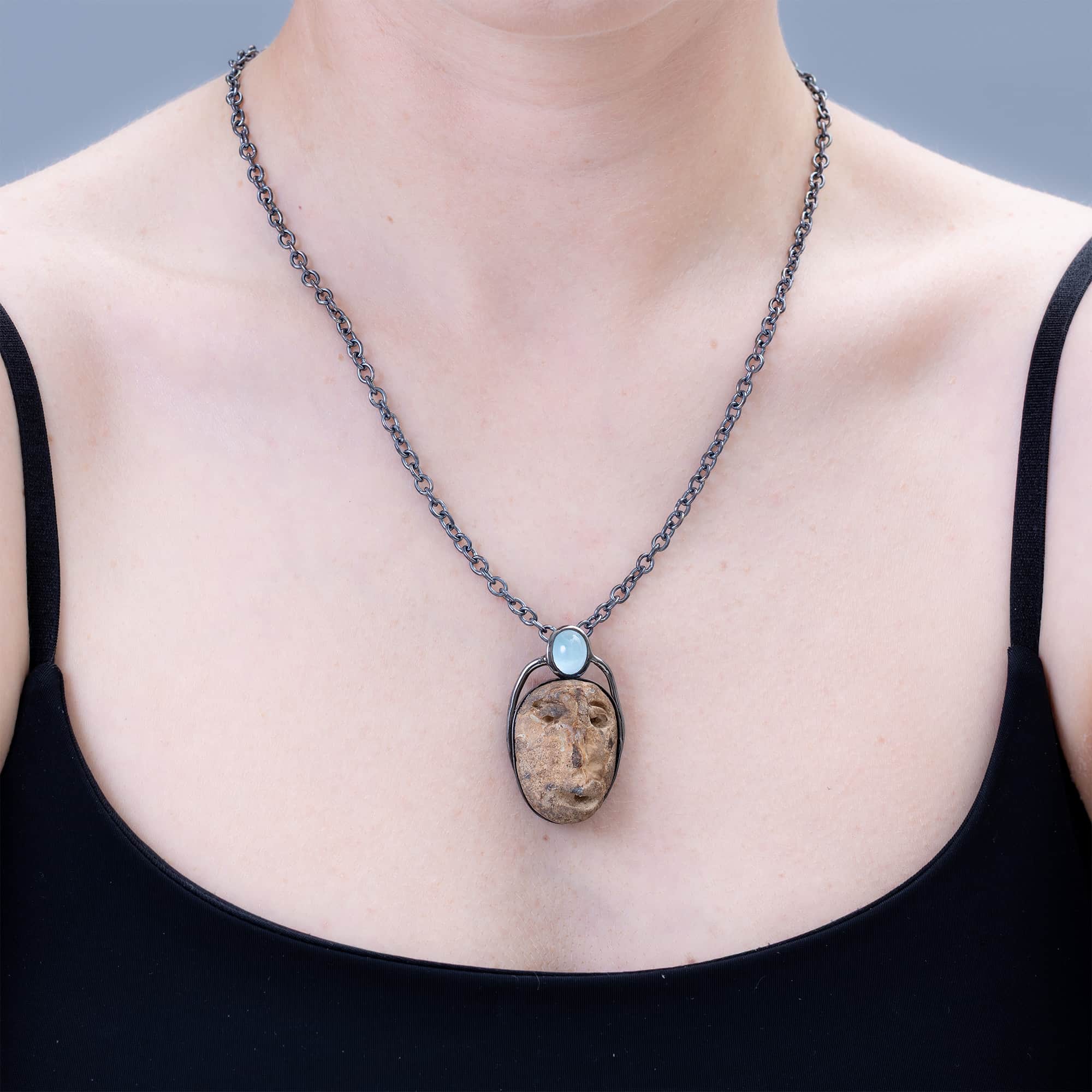 Strix Sterling Silver Pendant with Ancient Mediterranean Limestone Maskette & Oval Aquamarine