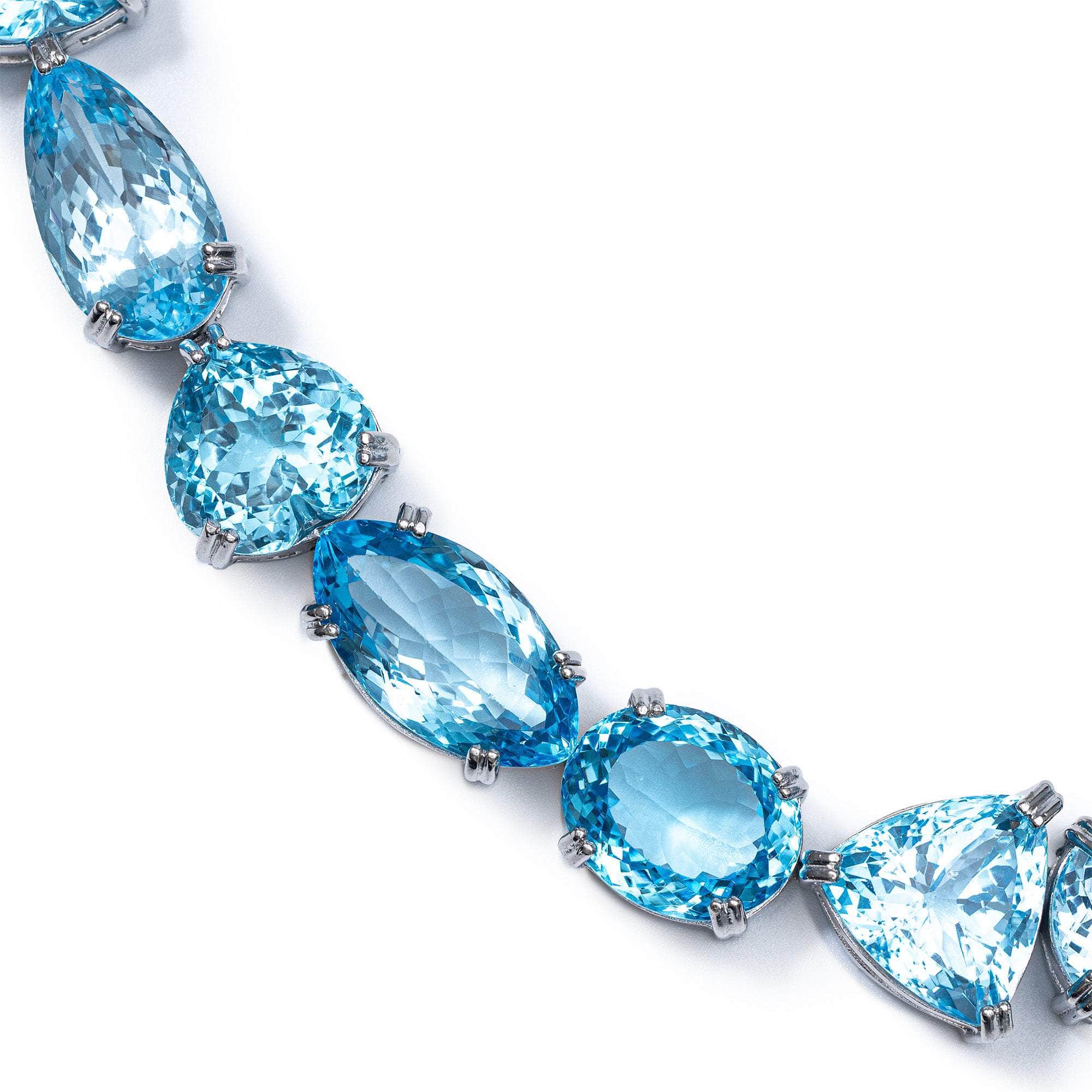 Thalyn Sterling Silver Necklace With Mixed-Cut Blue Topaz Gemstones in Statement Design