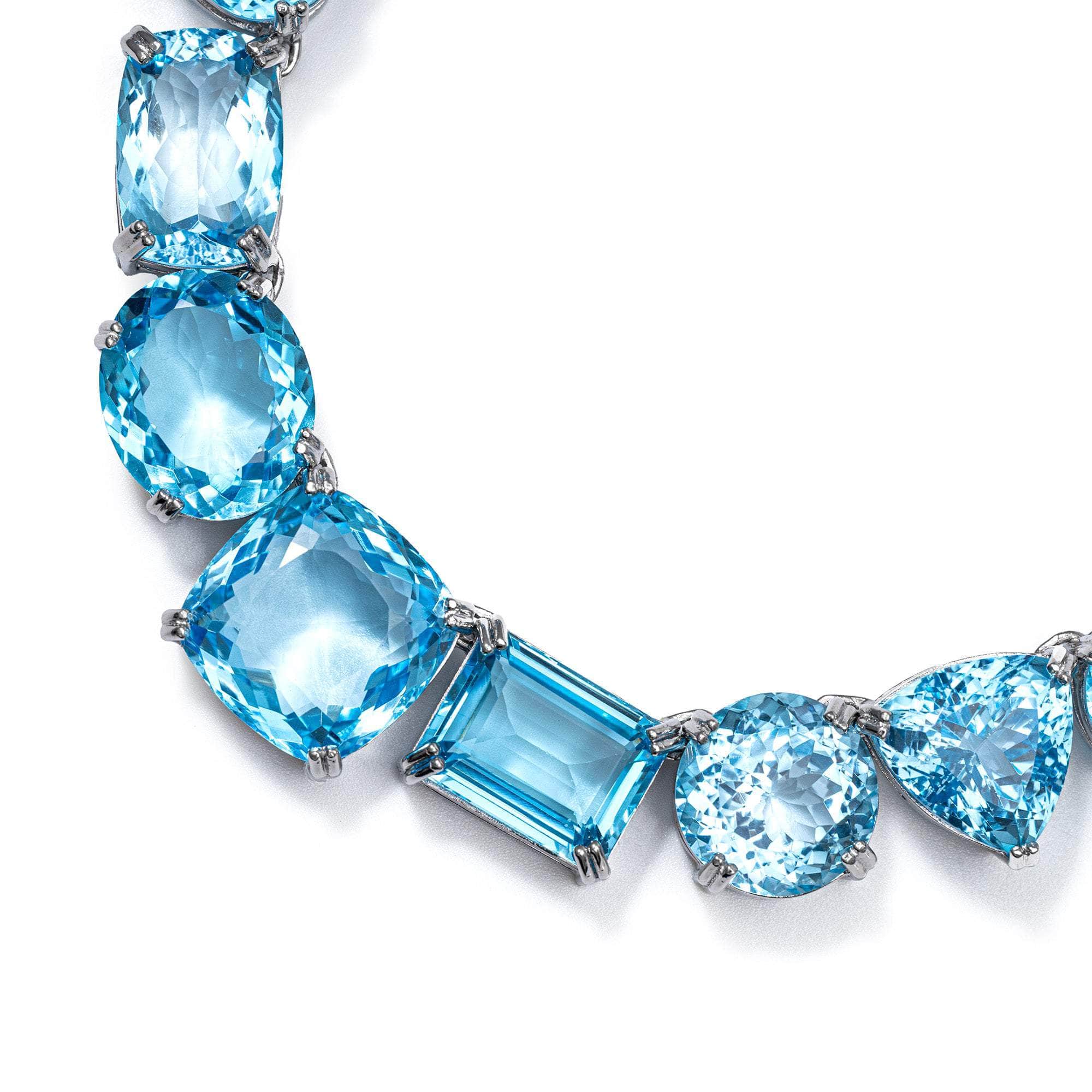 Ophira Sterling Silver Necklace Featuring Multiple Blue Topaz Cuts in Modern Artisan Setting