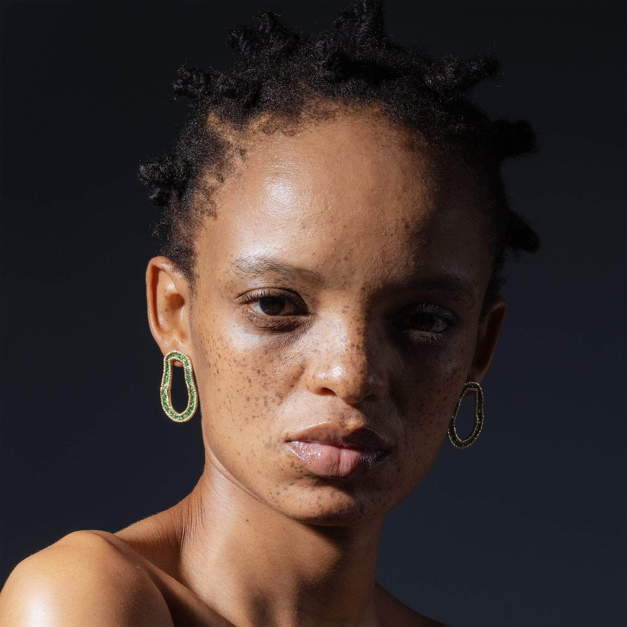 Arven Sculptured Gold Plated Silver Earrings with Raw Tsavorite Garnet