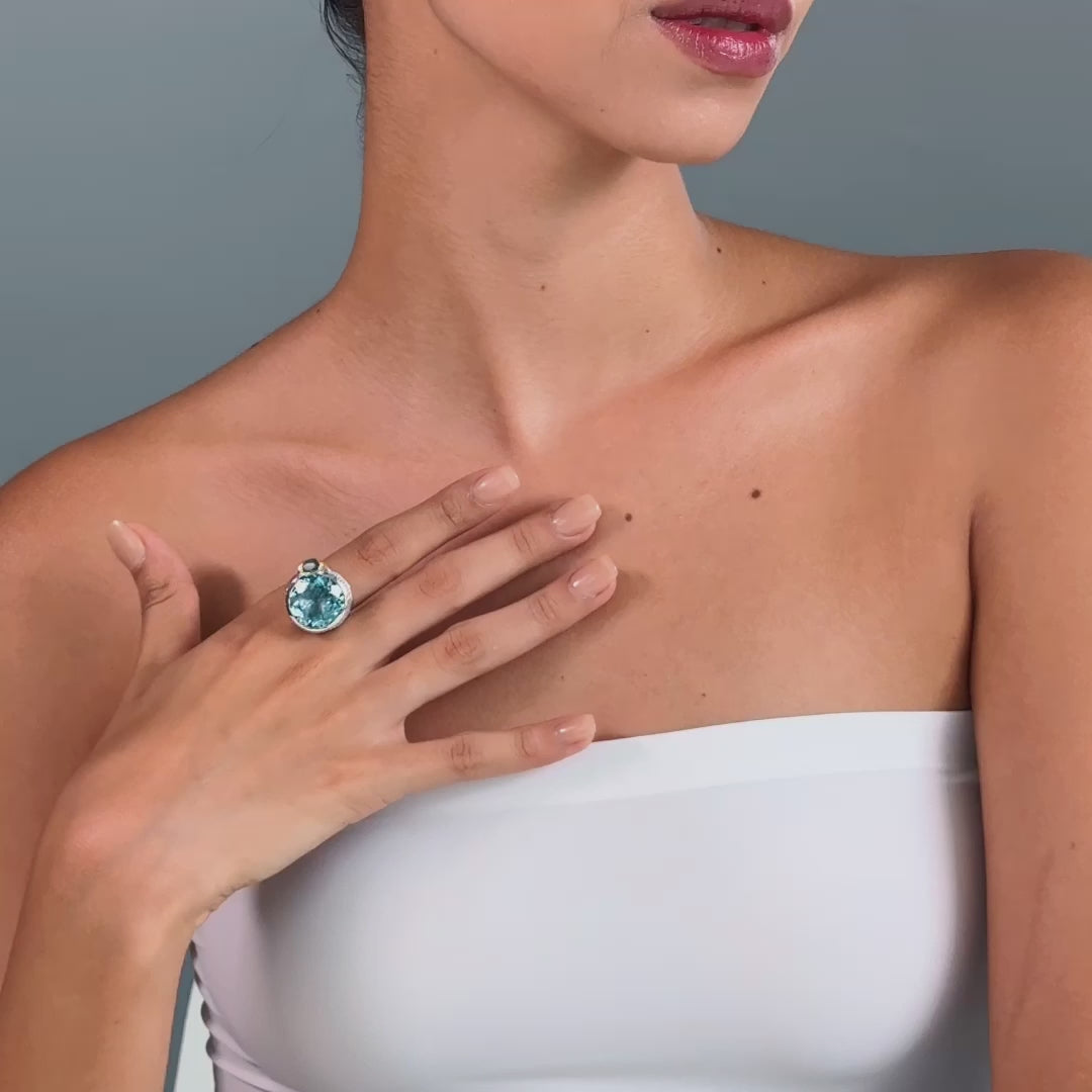 Polaris Blue Topaz and Sapphire Ring