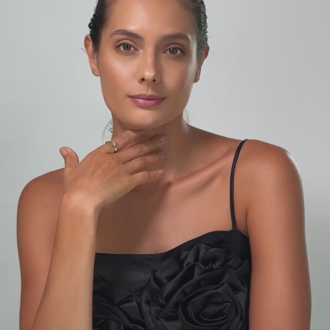 Faure Open Black Silver Ring with Natural Pear-Cut Peridot