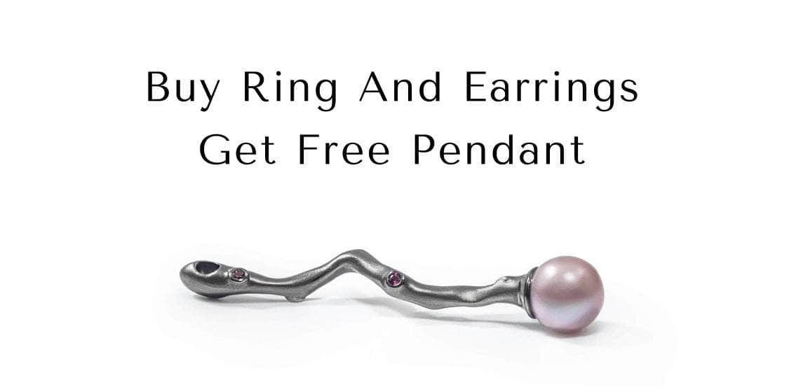 Silver jewelry with a pearl pendant on a white background, promotional text for free pendant offer.
