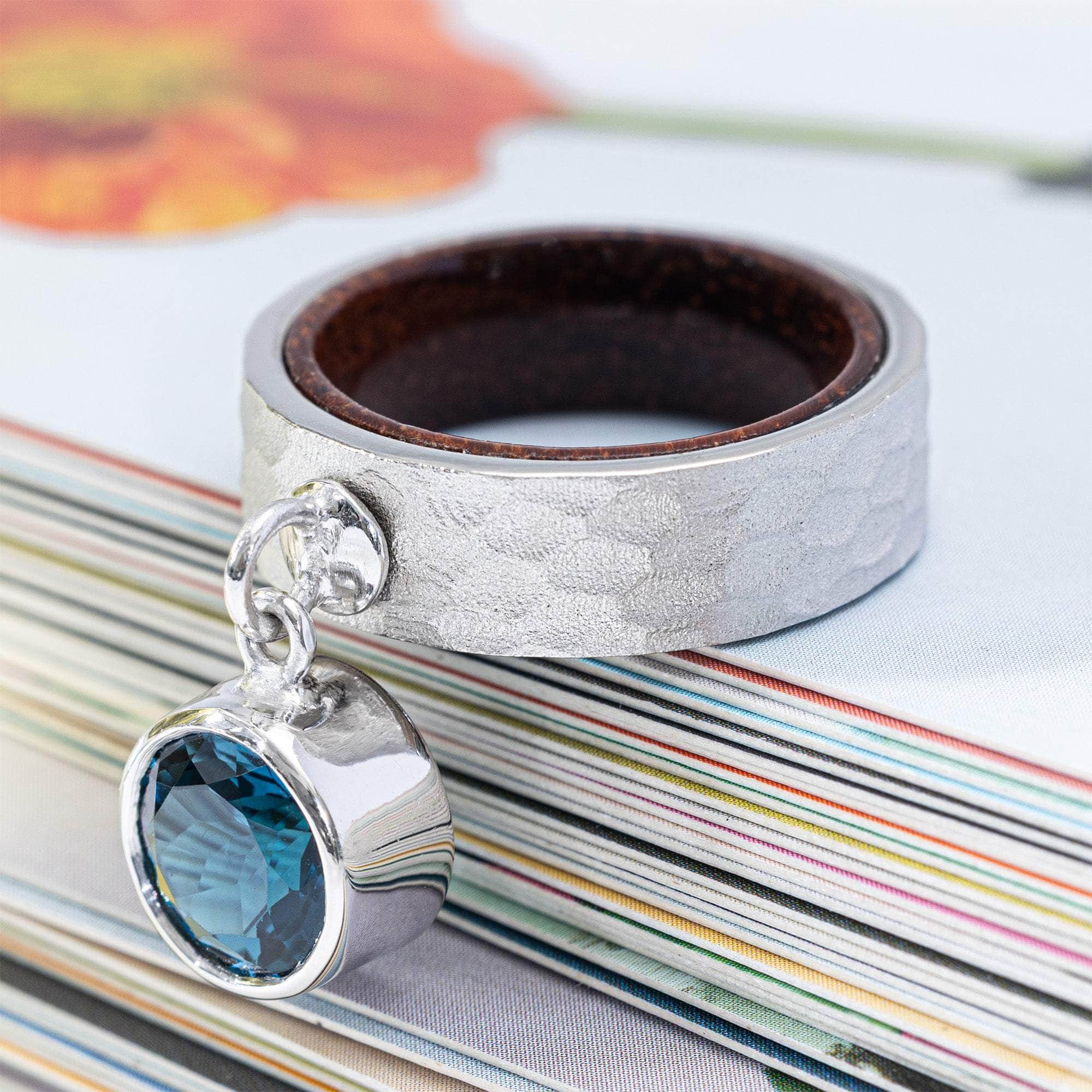 Undine Silver & Rosewood Ring with Suspended Blue Topaz