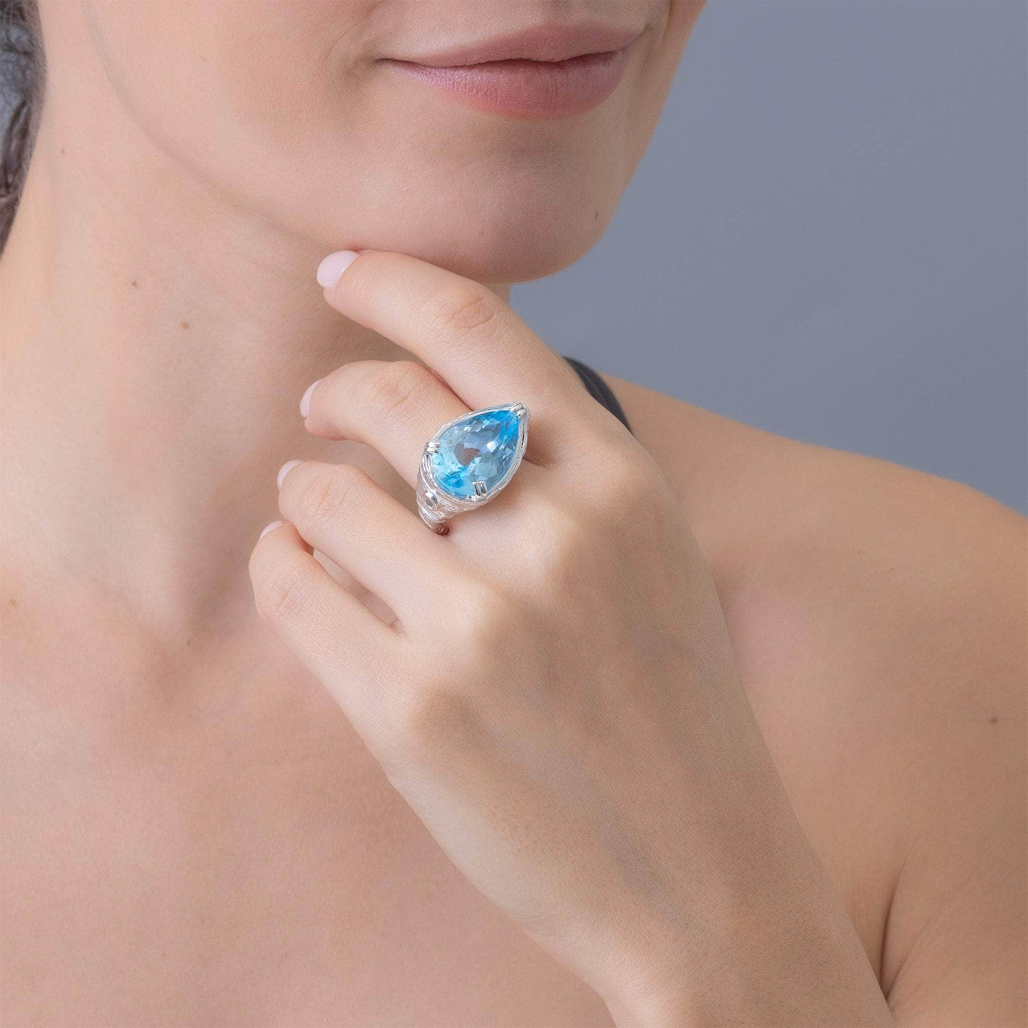 Aqua Textured 925 Silver Ring with Natural Pear-cut Blue Topaz