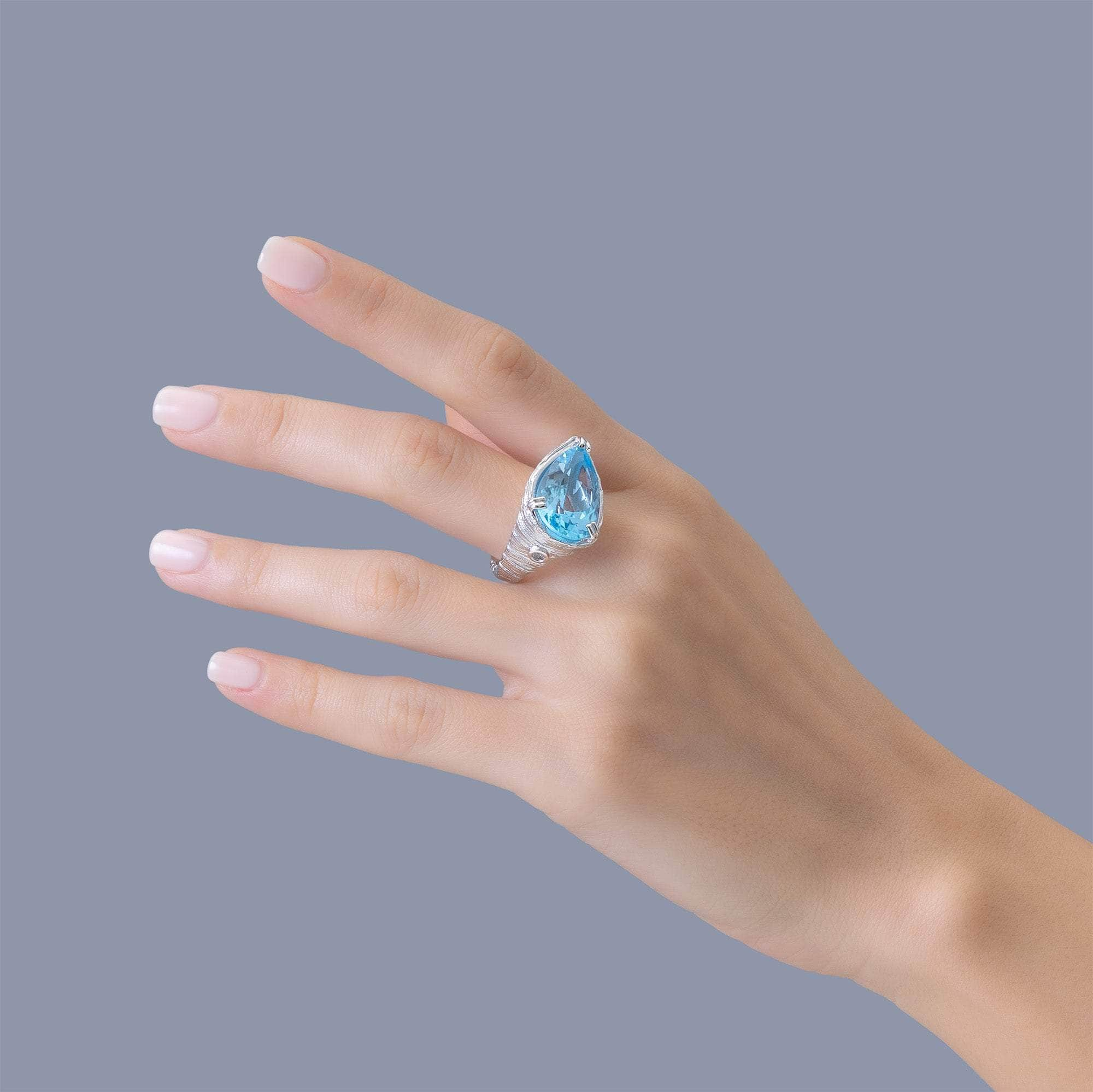 Aqua Textured 925 Silver Ring with Natural Pear-cut Blue Topaz