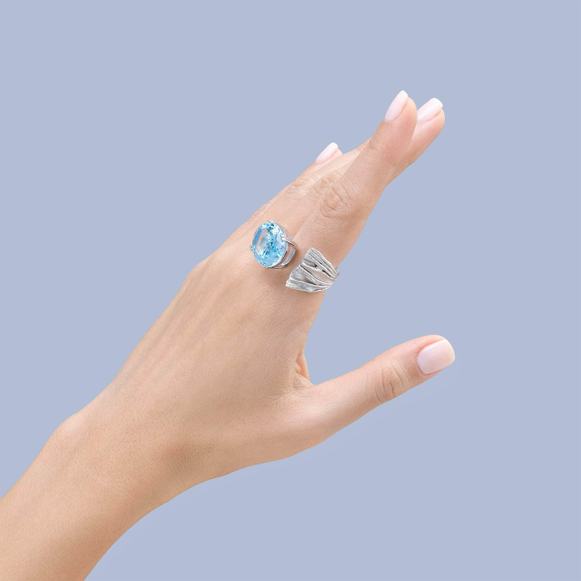 Caelum 925 Silver Textured Open Ring with Natural Oval-cut Blue Topaz