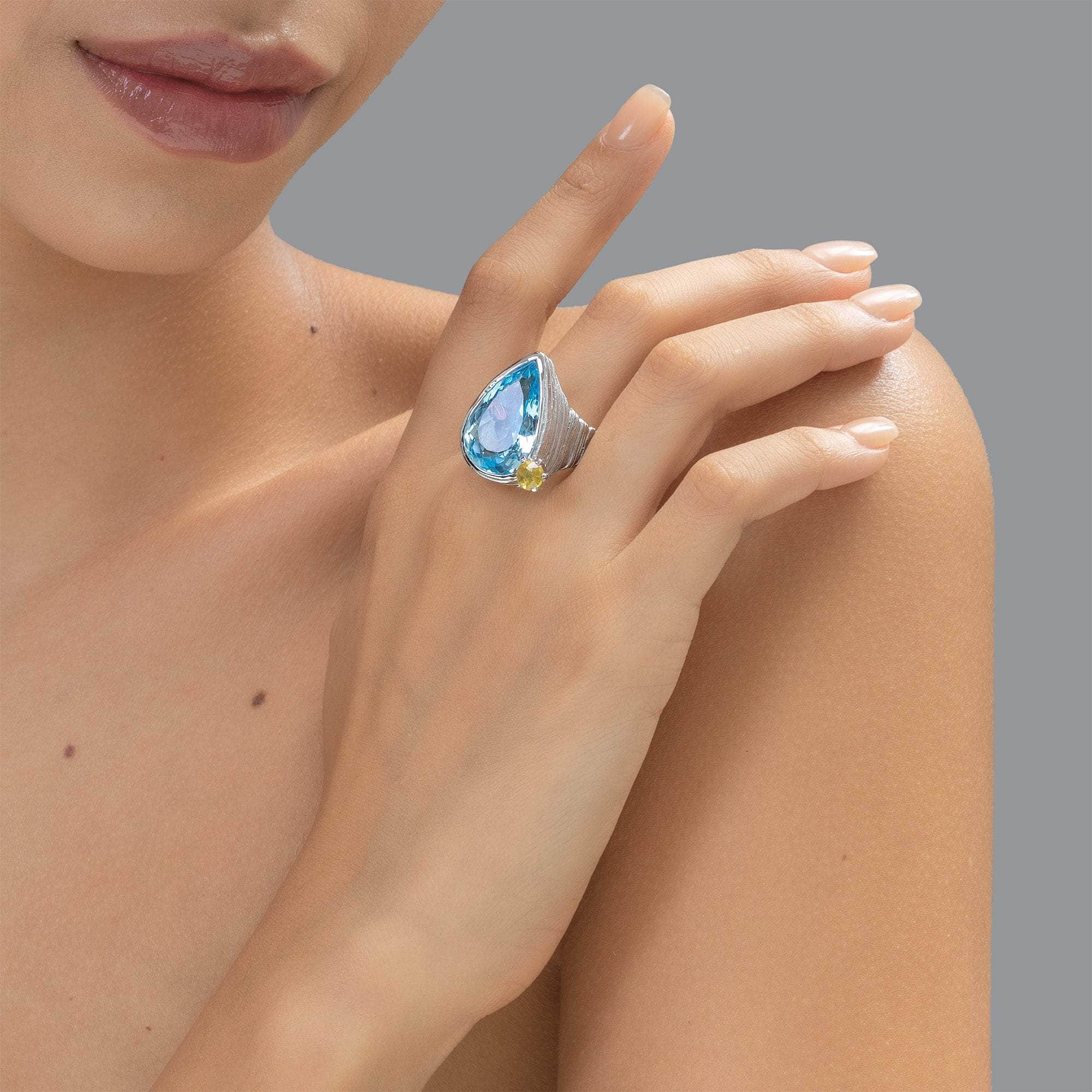Matar Blue Topaz and Sapphire Ring