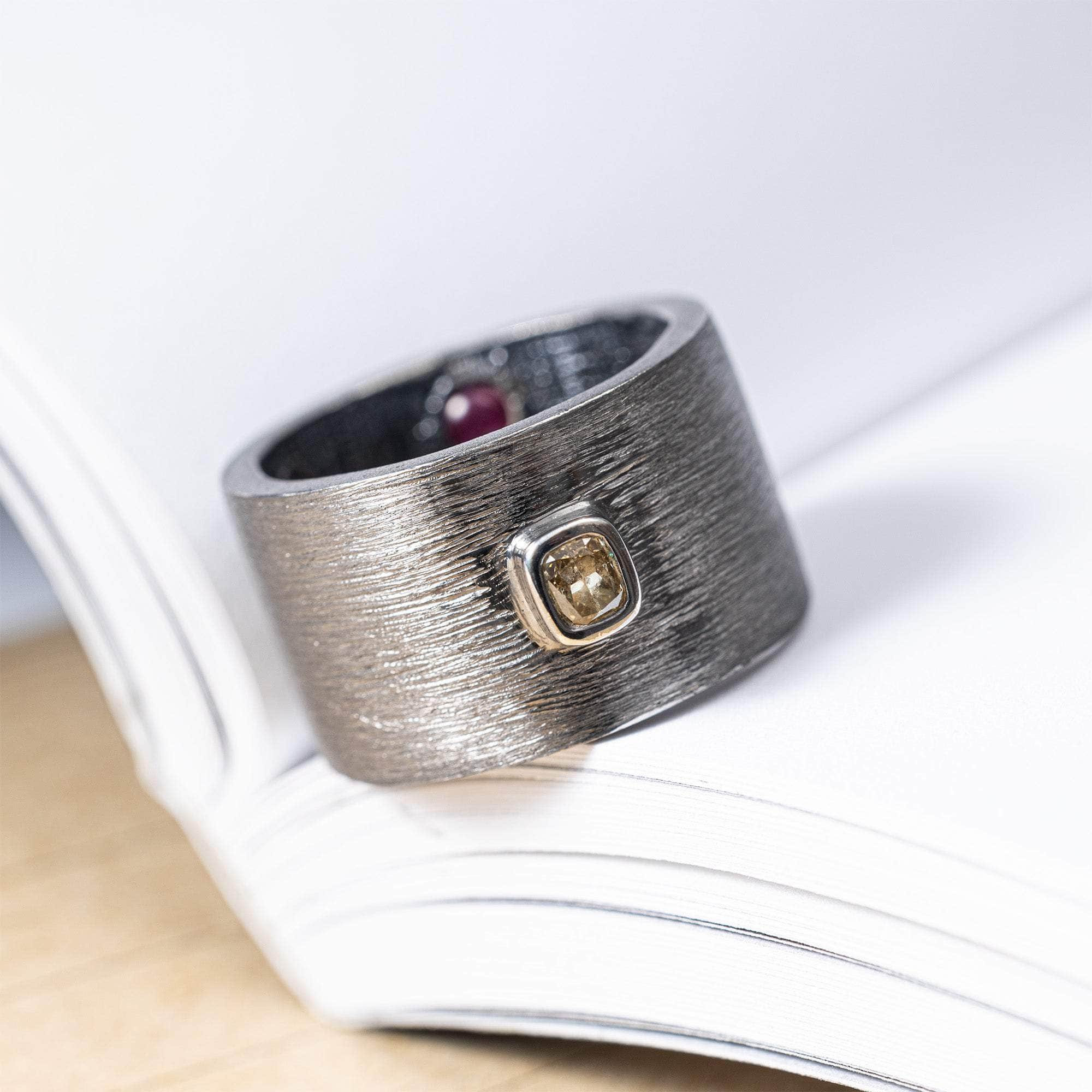 Intra Singular Statement Ring with 0.20 Carat Golden Olive Diamond & Hidden Round Cabochon Rubies Inside