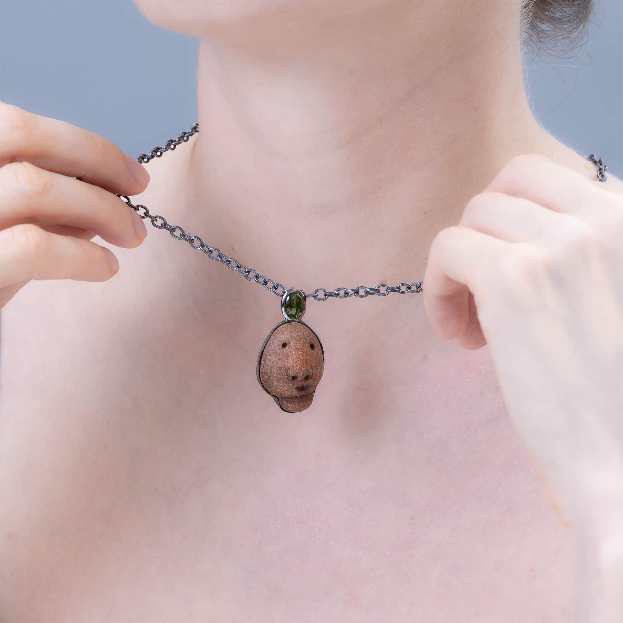 Anima Sterling Silver Pendant with Ancient Mediterranean Limestone Maskette & Green Tourmaline