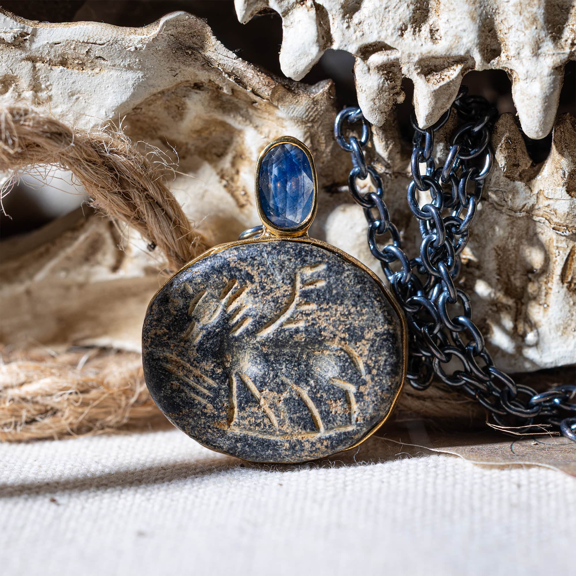 Shedu Silver Necklace with Ancient Near Eastern Steatite Winged Figure Amulet and Natural Sapphire