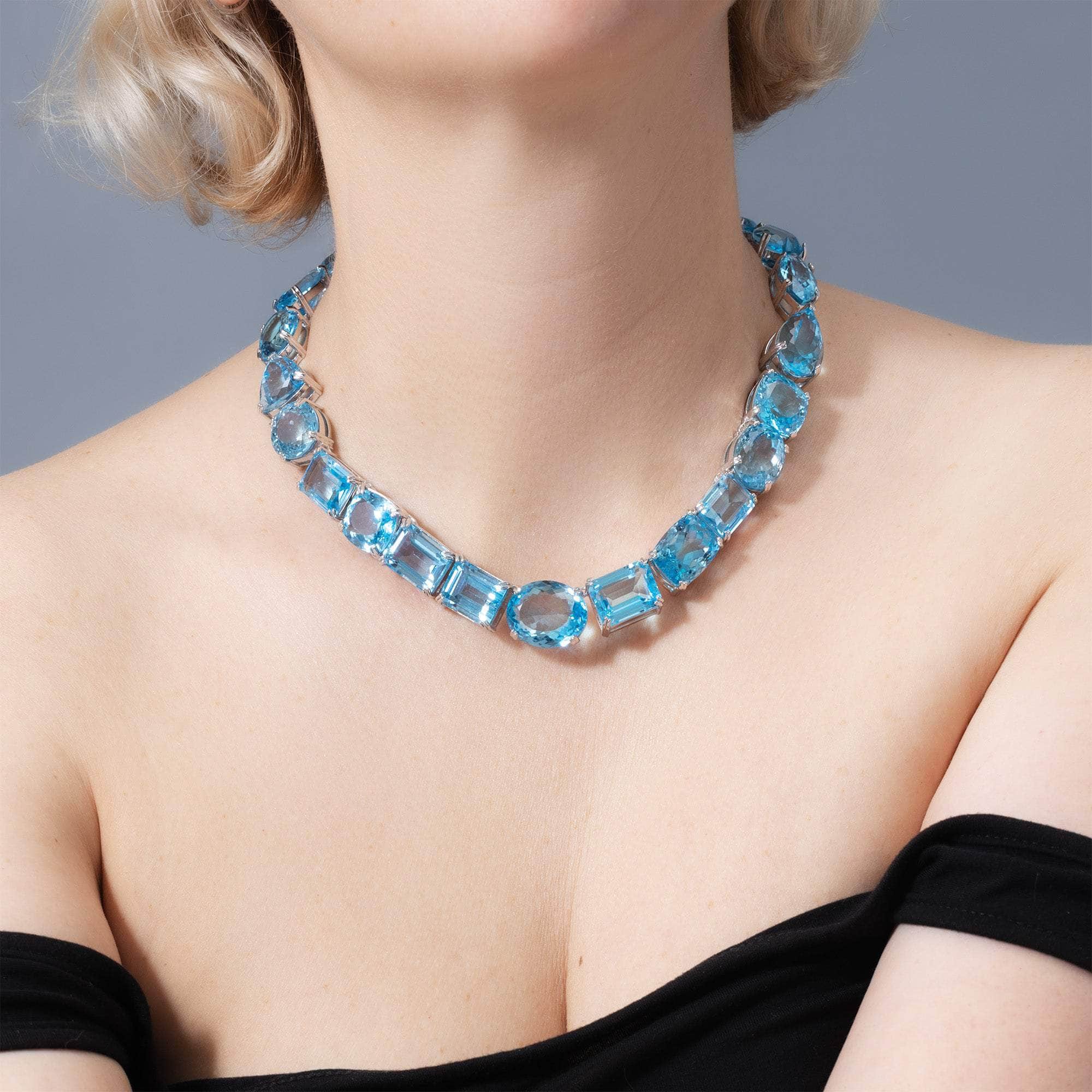 Thalyn Sterling Silver Necklace With Mixed-Cut Blue Topaz Gemstones in Statement Design