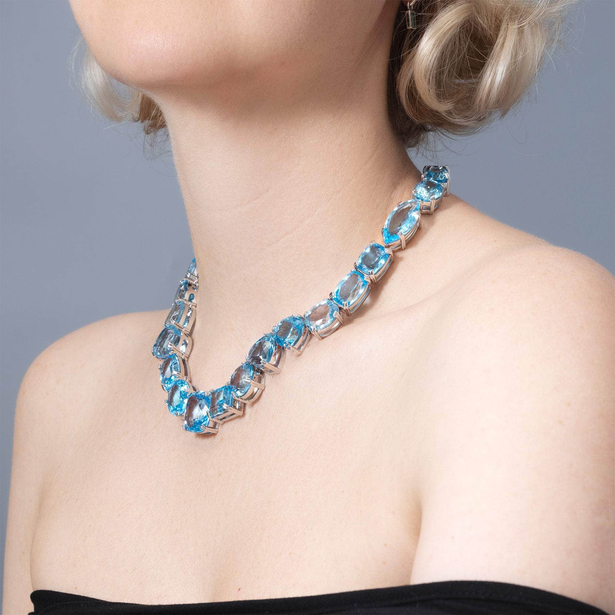 Ophira Sterling Silver Necklace Featuring Multiple Blue Topaz Cuts in Modern Artisan Setting