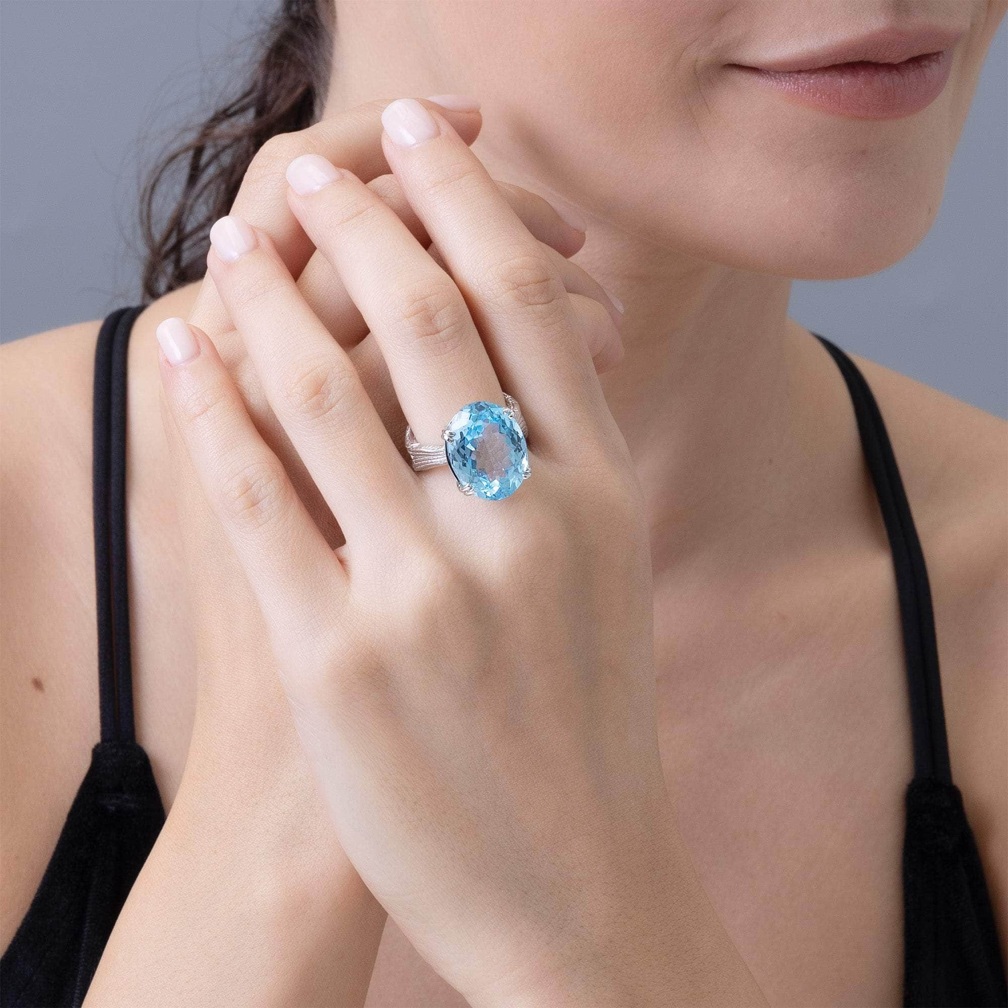 Nila Textured 925 Silver Ring with Natural Oval-Cut Blue Topaz