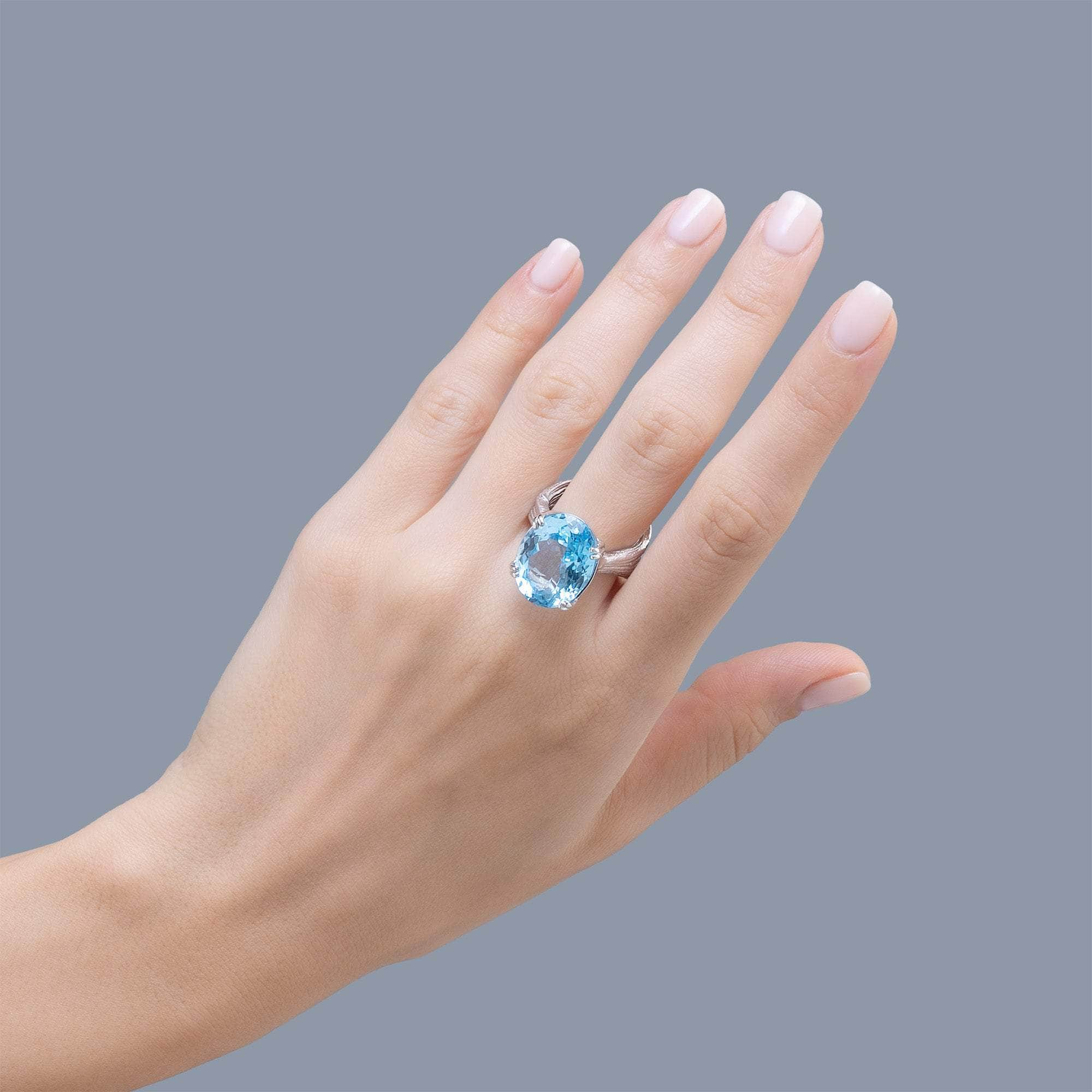 Nila Textured 925 Silver Ring with Natural Oval-Cut Blue Topaz