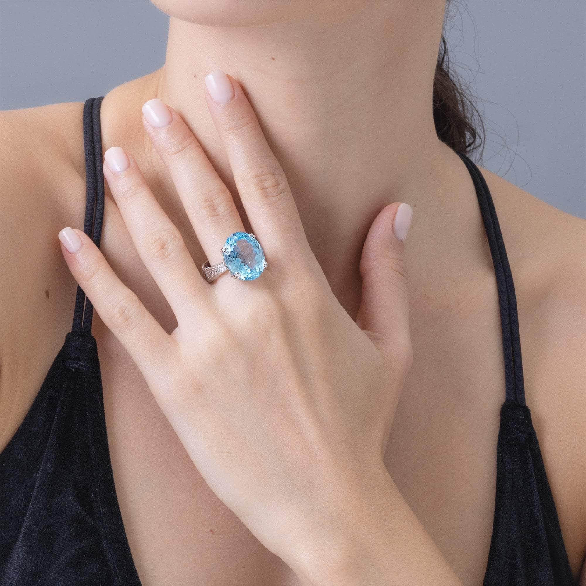 Nila Textured 925 Silver Ring with Natural Oval-Cut Blue Topaz