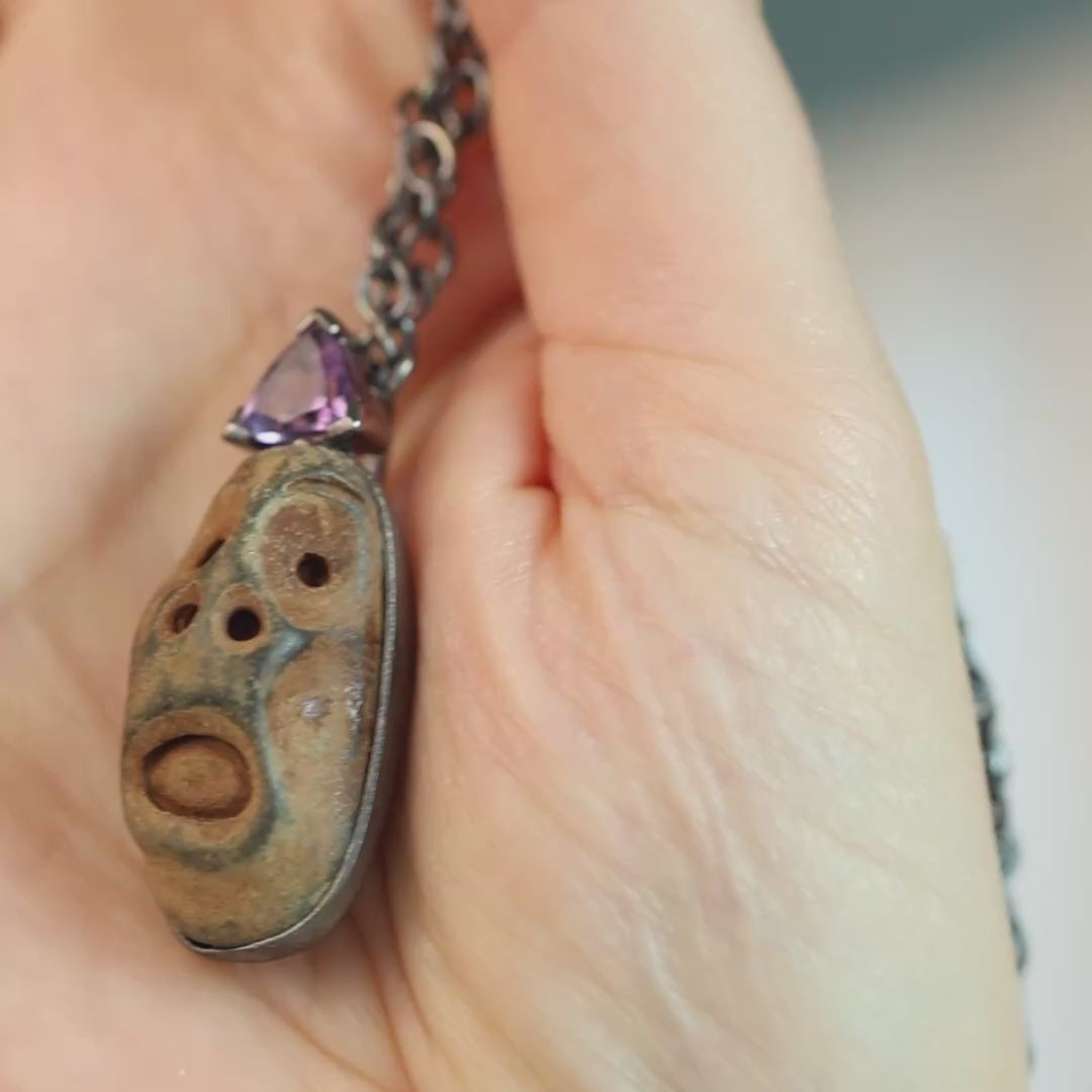 Chaos Sterling Silver Pendant with Ancient Mediterranean Limestone Maskette & Natural Trillion Amethyst