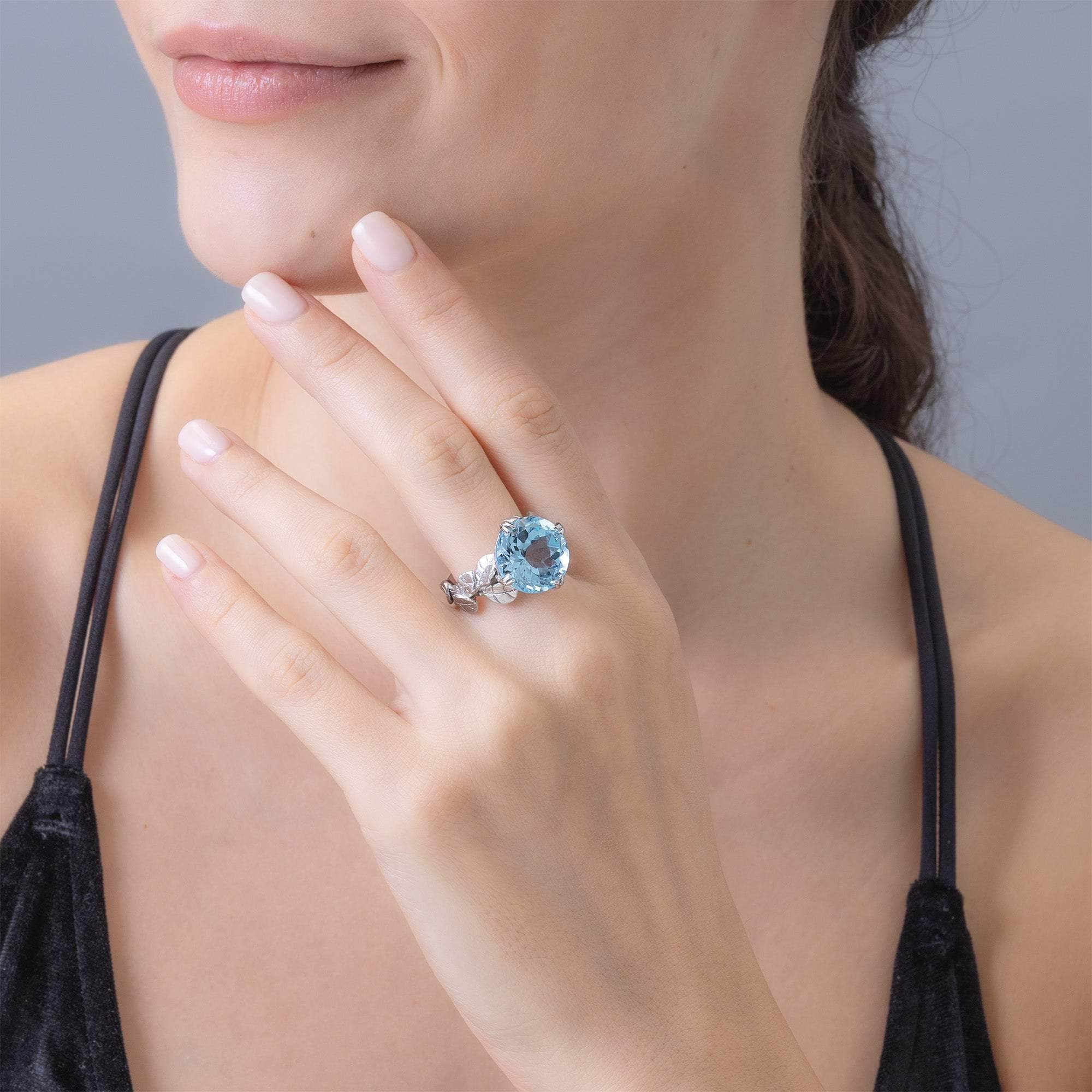 Sobek Leaf Motif 925 Silver Ring with Natural Round-Cut Blue Topaz