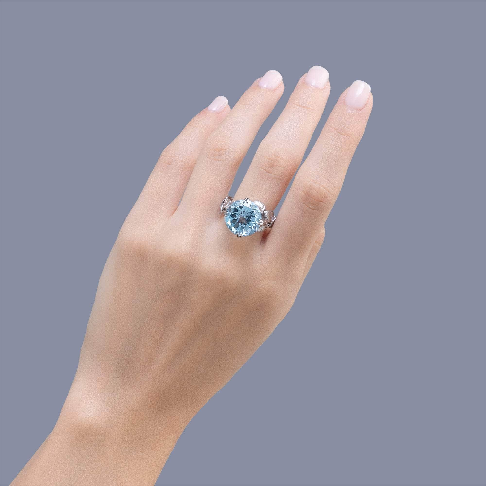 Sobek Leaf Motif 925 Silver Ring with Natural Round-Cut Blue Topaz